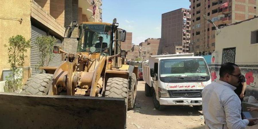 حملة مكبرة لرفع الإشغالات بشارع 135 بحي غرب شبرا الخيمة - صور